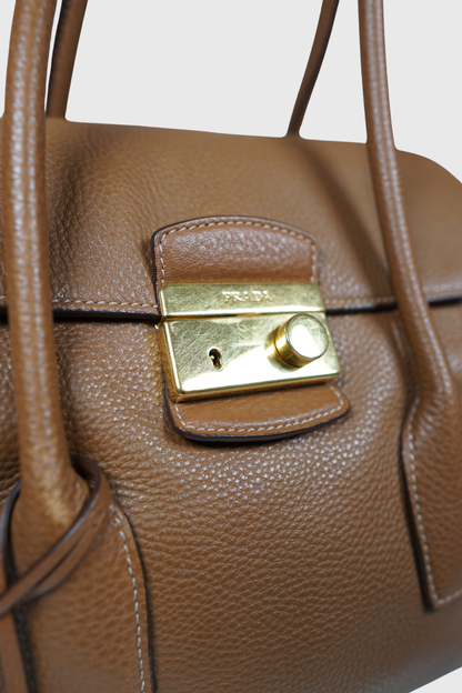 PRADA Vitello Daino Sound Lock brandy